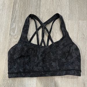 Lululemon, free to be serene sports bra in a black/grey snake print, size 8